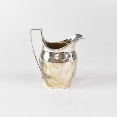 Lot 805 - A George V hallmarked silver milk jug, William...