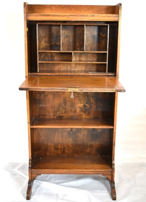 Lot 51 - A 20th century oak students bureau over...