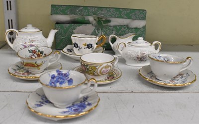 Lot 473 - A small collection of miniature ceramics...