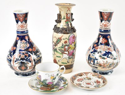 Lot 544 - A pair of Japanese Imari baluster form vases...