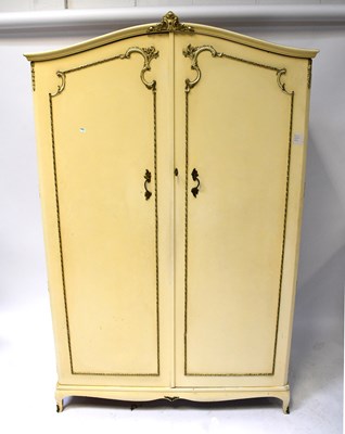 Lot 34 - A five-piece gilt-heightened cream bedroom...