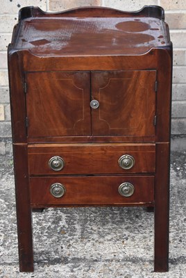 Lot 14 - A Georgian mahogany night cupboard with pair...