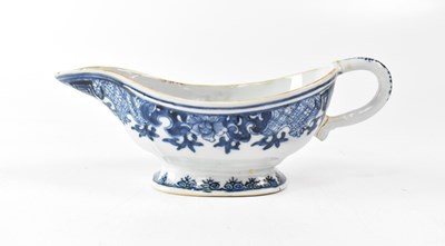 Lot 426 - A Chinese blue and white hand painted sauce...