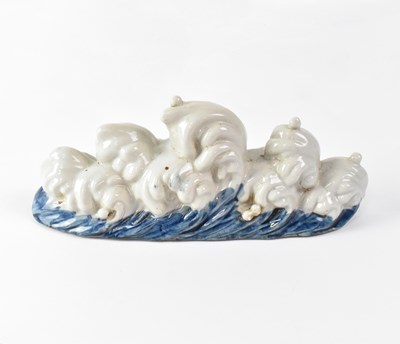 Lot 500 - A Chinese blue and white decorated brush rest...