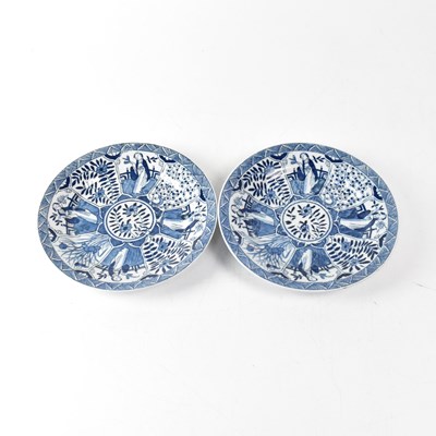 Lot 496 - A pair of Chinese blue and white painted...