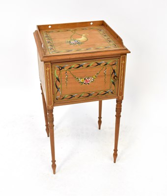 Lot 50 - A painted satinwood single-door pot cupboard...