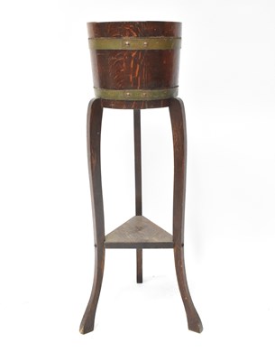 Lot 49 - An early 20th century torchère stand in the...