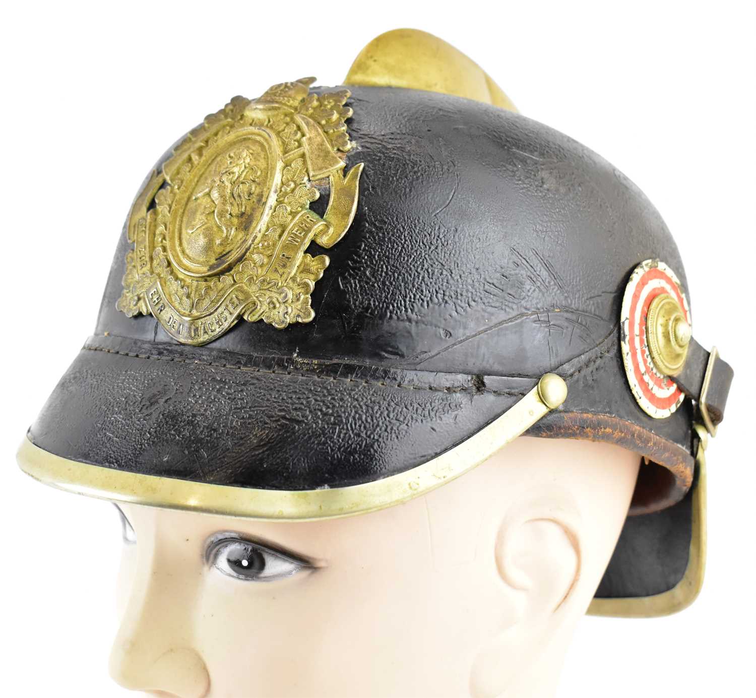 Lot 566 - An Imperial German Hessian fireman-style helmet.