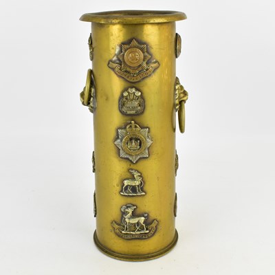 Lot 516 - A Trench Art poker stand made from an...