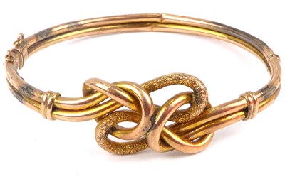 Lot 1027 - A 9ct gold puzzle bracelet with hollow tube...