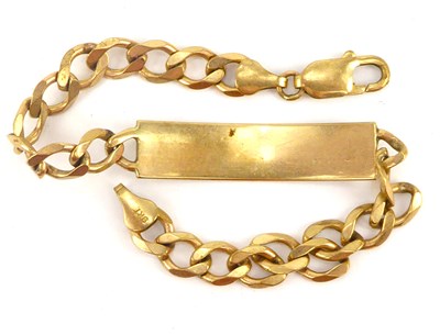 Lot 1023 - A 9ct gold identity bracelet with central...