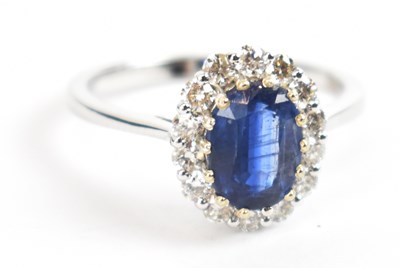 Lot 678 - An 18ct white gold oval kyanite and diamond...