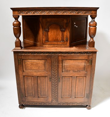 Lot 30 - A reproduction oak court cupboard, with single...