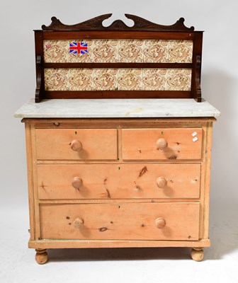 Lot 48 - An early 20th century pine chest of two short...