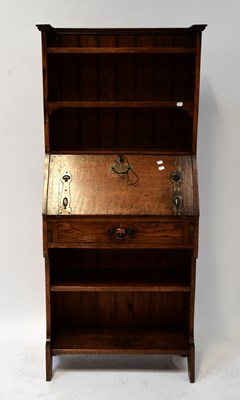 Lot 35 - An early 20th century oak Arts and Crafts...