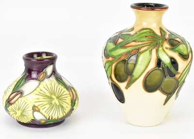 Lot 402 - MOORCROFT; a small vase of baluster form,...