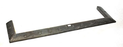 Lot 53 - An Arts & Crafts pewter clad fireside fender