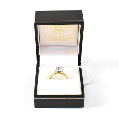 Lot 973 - An 18ct yellow gold 1ct diamond solitaire ring,...