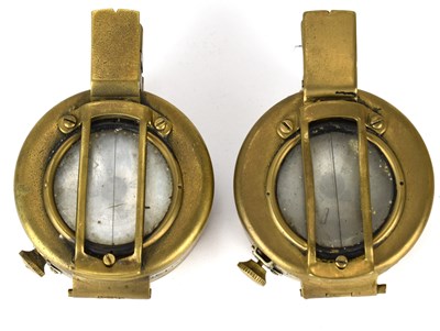 Lot 554 - Two WWII and later brass compasses, comprising...