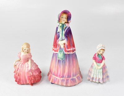 Lot 455 - ROYAL DOULTON; three figurines comprising,...