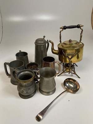 Lot 61 - A quantity of glass bottles, a brass kettle on...