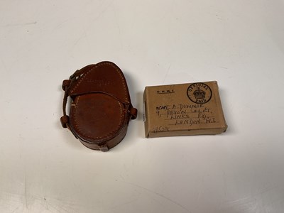 Lot 86 - A leather cased WWI pocket compass with...