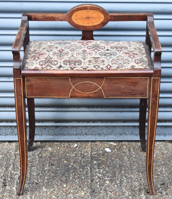 Lot 54 - An Edwardian inlaid piano stool with hinged...