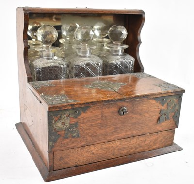 Lot 214 - A late Victorian oak and brass mounted...