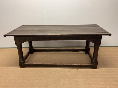 Lot 386 - An oak gun barrel oak table, height 76cm,...