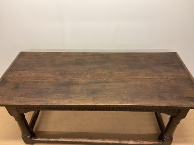 Lot 386 - An oak gun barrel oak table, height 76cm,...