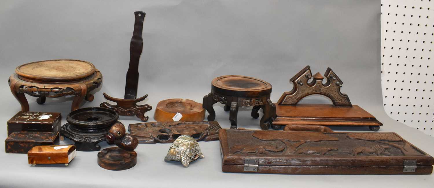 Lot 414 - A small group of treen including Oriental...