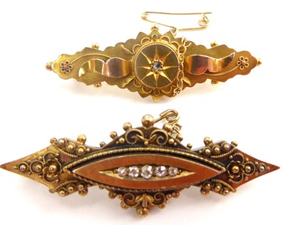 Lot 1050 - Two Victorian gold brooches, comprising a 15ct...