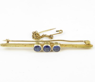 Lot 1055 - An early 20th century gold bar brooch with...