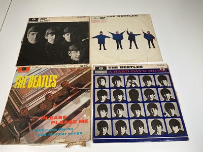 Lot 2106 - THE BEATLES; three records and an empty record...