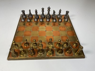 Lot 33 - A contemporary weighted mixed metal chess set,...