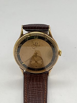 Lot 480 - OMEGA; a rare 1939 14ct yellow gold...