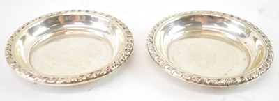 Lot 651 - A pair of sterling silver pin dishes, diameter...