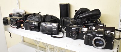 Lot 242 - A quantity of cameras, to include Canon,...