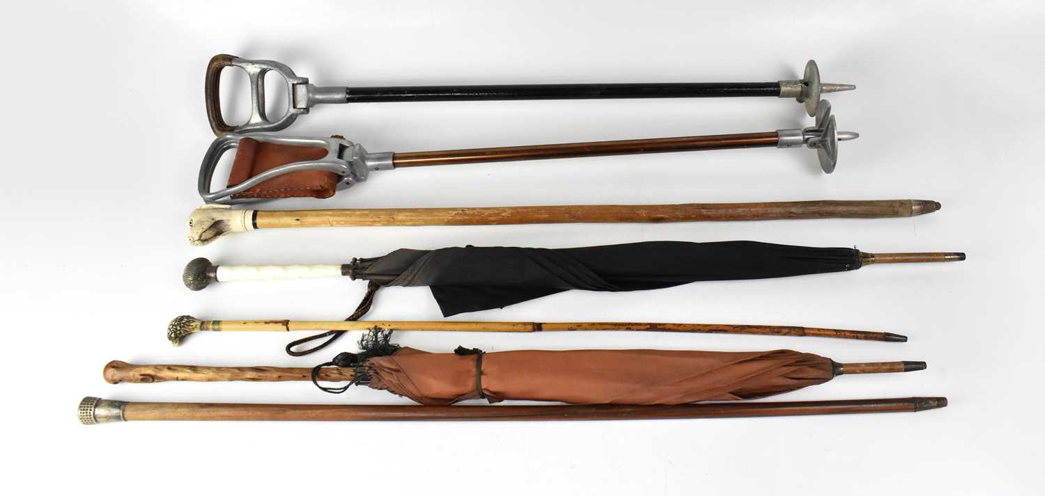 Lot 177 - A small collection of vintage walking sticks...