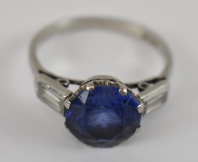 Lot 684 - A platinum, diamond and sapphire ring, the...