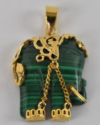 Lot 809 - An Indian malachite pendant modelled as an...