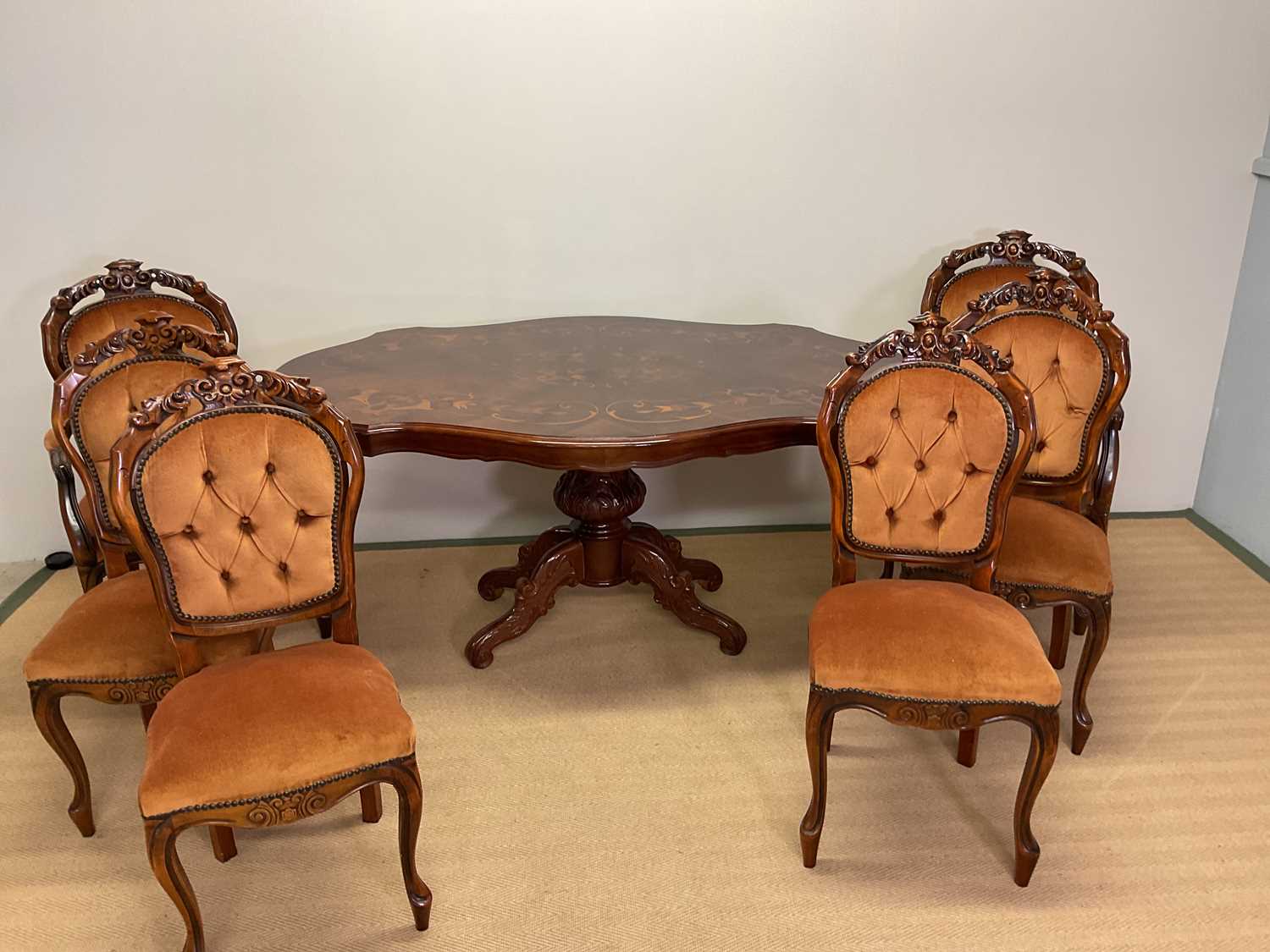 Lot 510 - A Continental inlay marquetry dining table,...