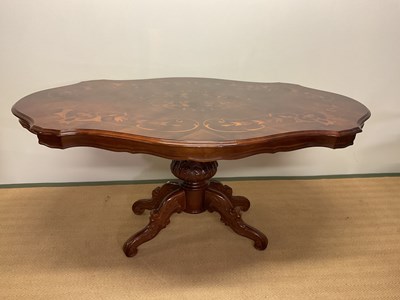 Lot 510 - A Continental inlay marquetry dining table,...