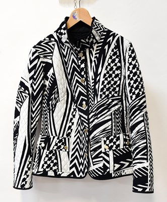 Lot 353 - A black and white quilted jacket, a Jaeger...