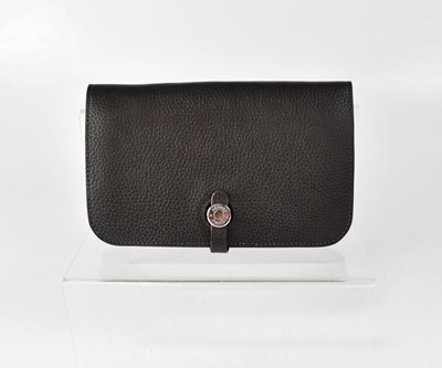 Lot 363 - HERMES, PARIS; a dark brown hand-stitched...