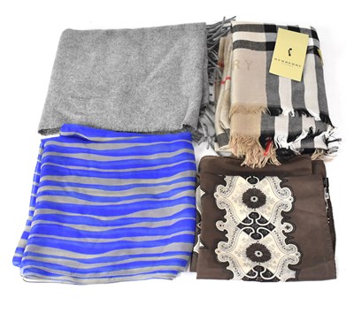 Lot 367 - Four designer scarves comprising a Burberry of...