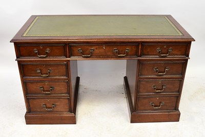 Lot 31 - A reproduction mahogany nine-drawer twin...