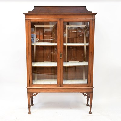 Lot 68 - An Edwardian walnut two-door glazed display...