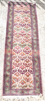 Lot 101 - A hand knotted woollen runner, 244 x 75cm.