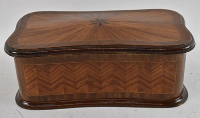 Lot 204 - A Continental kingwood parquetry inlaid shaped...